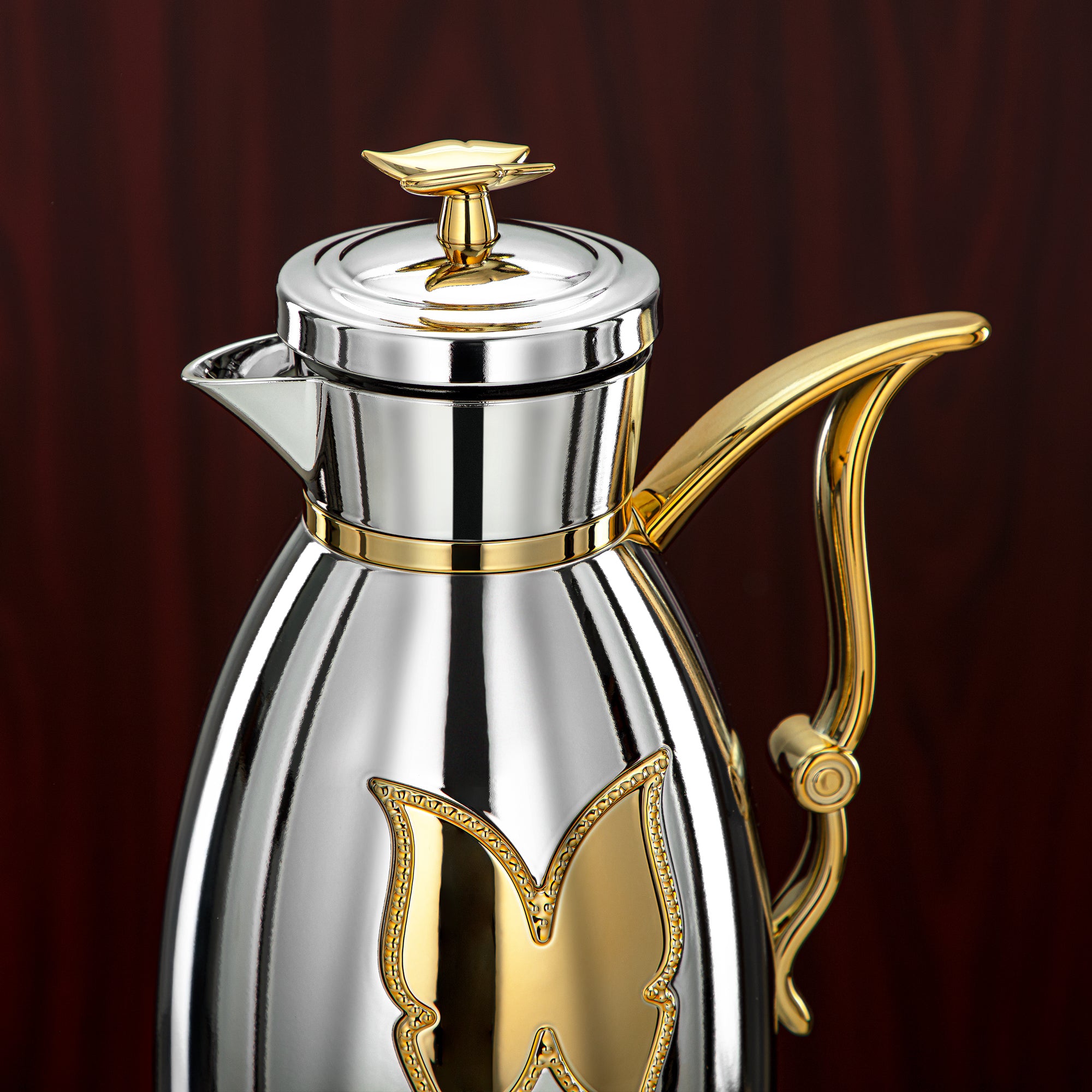 طقم ترامس المرجان زر ضغط بلاستيك 0.7 لتر + 1 لتر فضي وذهبي (SM-2C142-070/100 C/G) - زجاجة شاي وقهوة